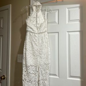 Beautiful backless white halter dress.